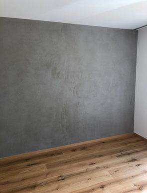 Glatte graue Wand mit Struktur