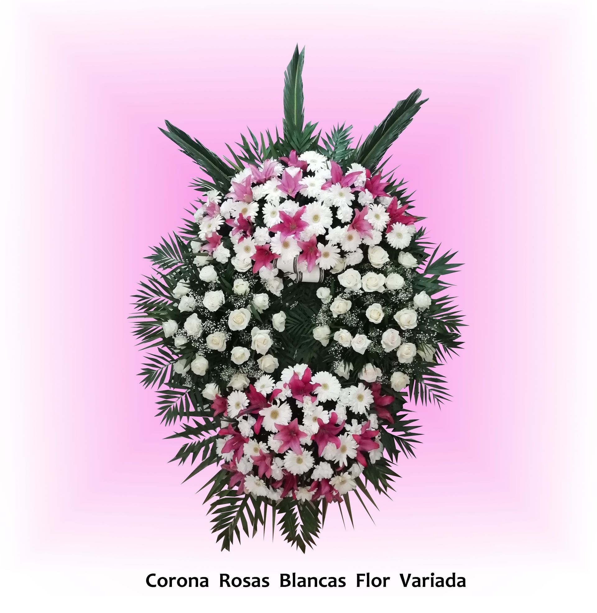 Una corona rasas blancas flor varlada con flores rosas y blancas