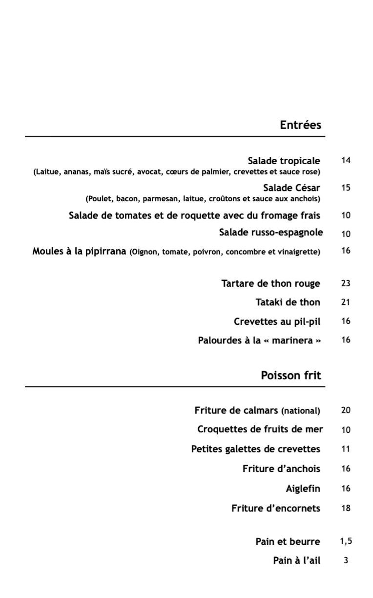 Una imagen en blanco y negro de un menú de un restaurante.