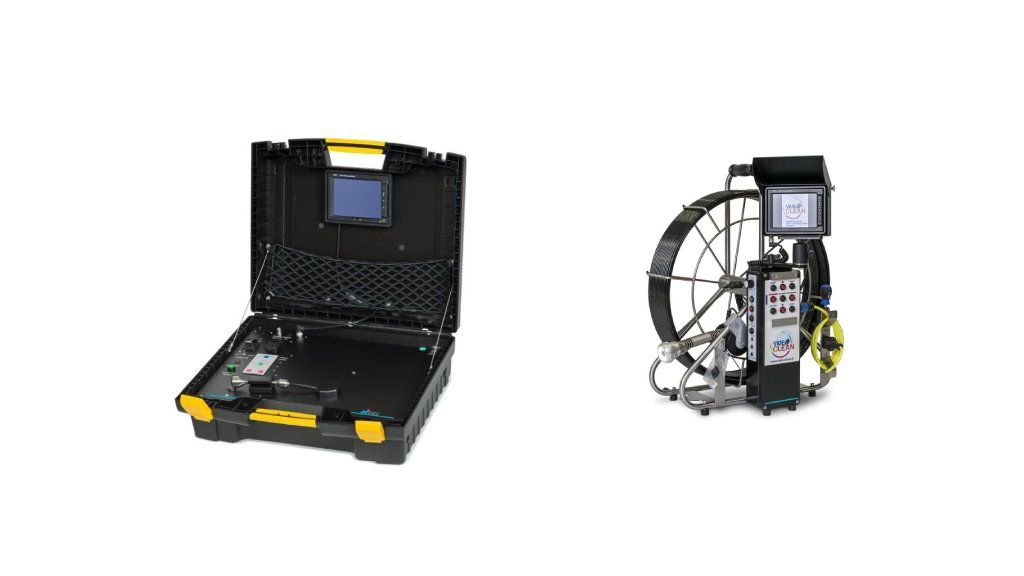 Boîtier noir ouvert avec loquets jaunes et appareil métallique compact à roulettes avec écran et bobine
