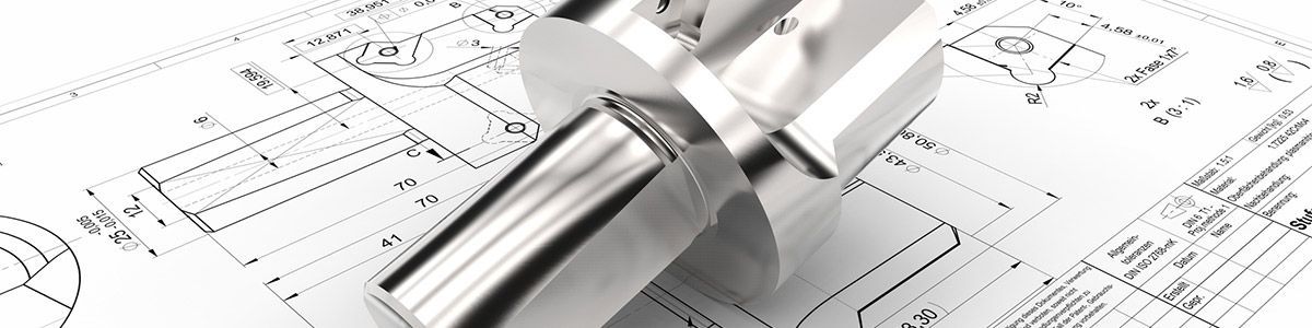 Eine Nahaufnahme eines Metallobjekts auf einer Zeichnung.