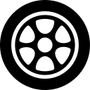Un icono en blanco y negro de una rueda de automóvil sobre un fondo blanco.