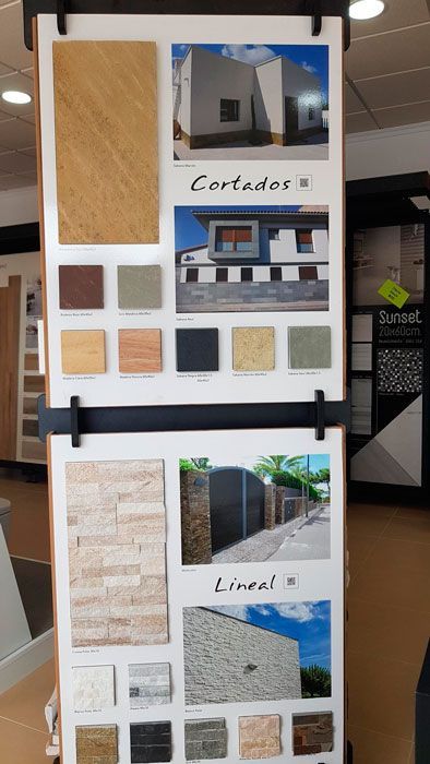 Una exhibición de diferentes tipos de azulejos con la palabra cortados en la parte superior