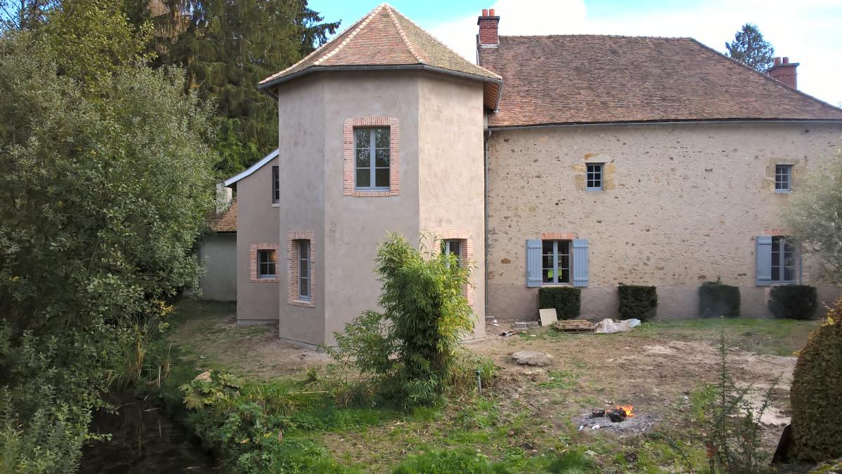 Rénovation d'une maison avec tour