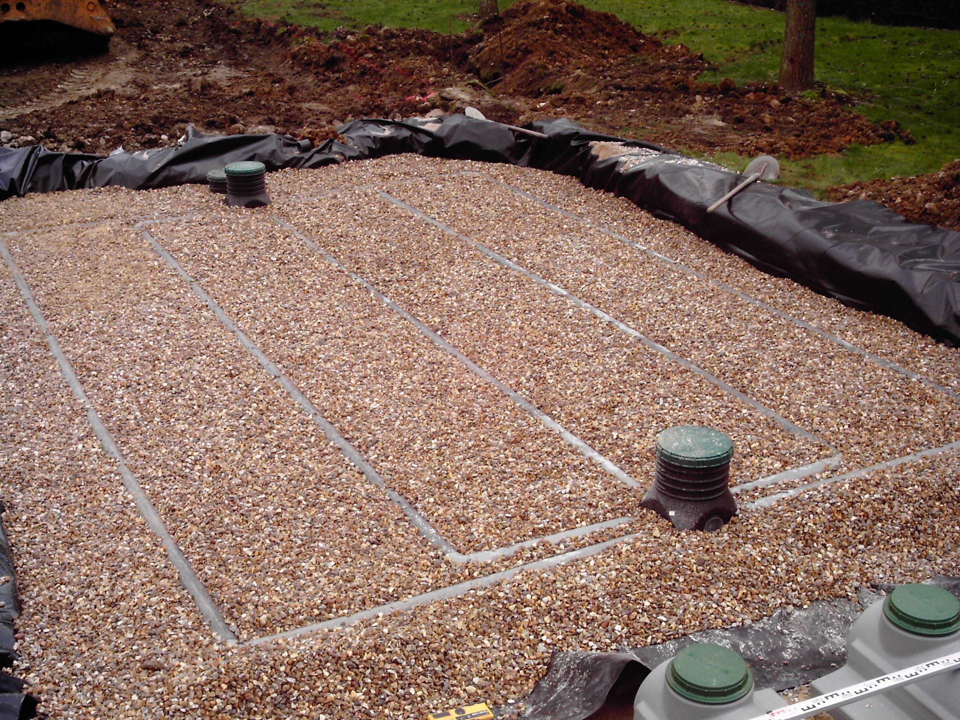 Remplissage d'un système d'assainissement avec des gravats