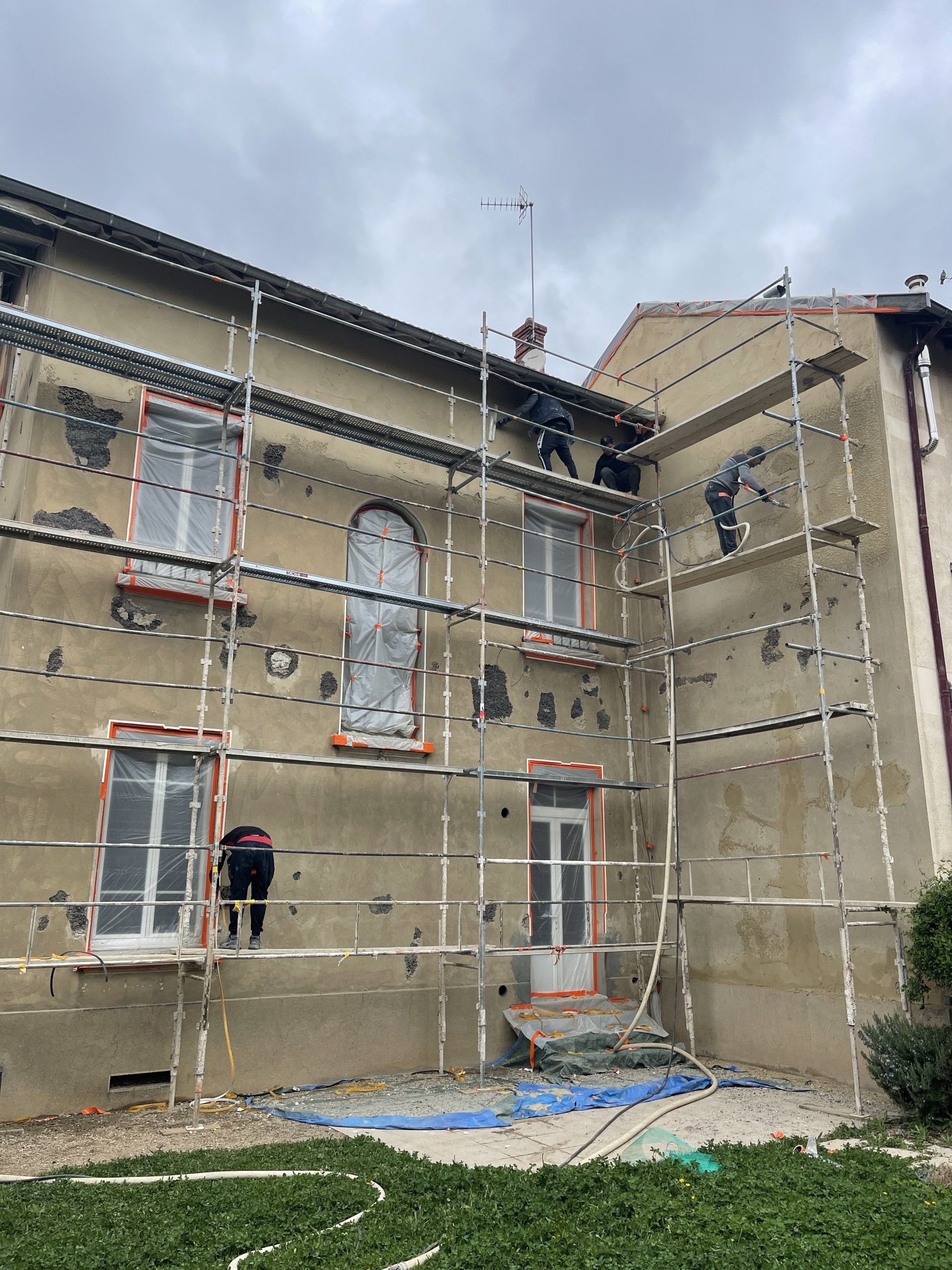 Projection d'enduit sur une façade
