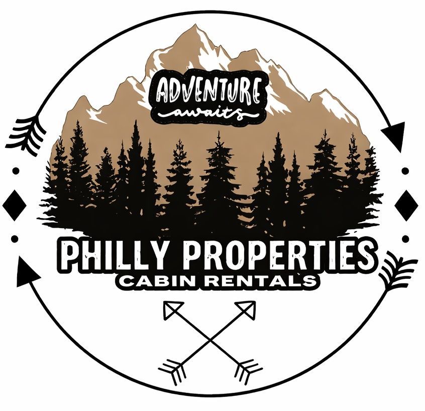 Logo for Philly Properties Cabin Rentals featuring a mountain range, pine trees, and crossed arrows in a circular frame.