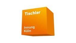 Ein orangefarbener Würfel mit dem Wort Tischler darauf.