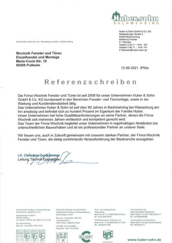 Ein unterschriebener Brief steht auf weißem Hintergrund.