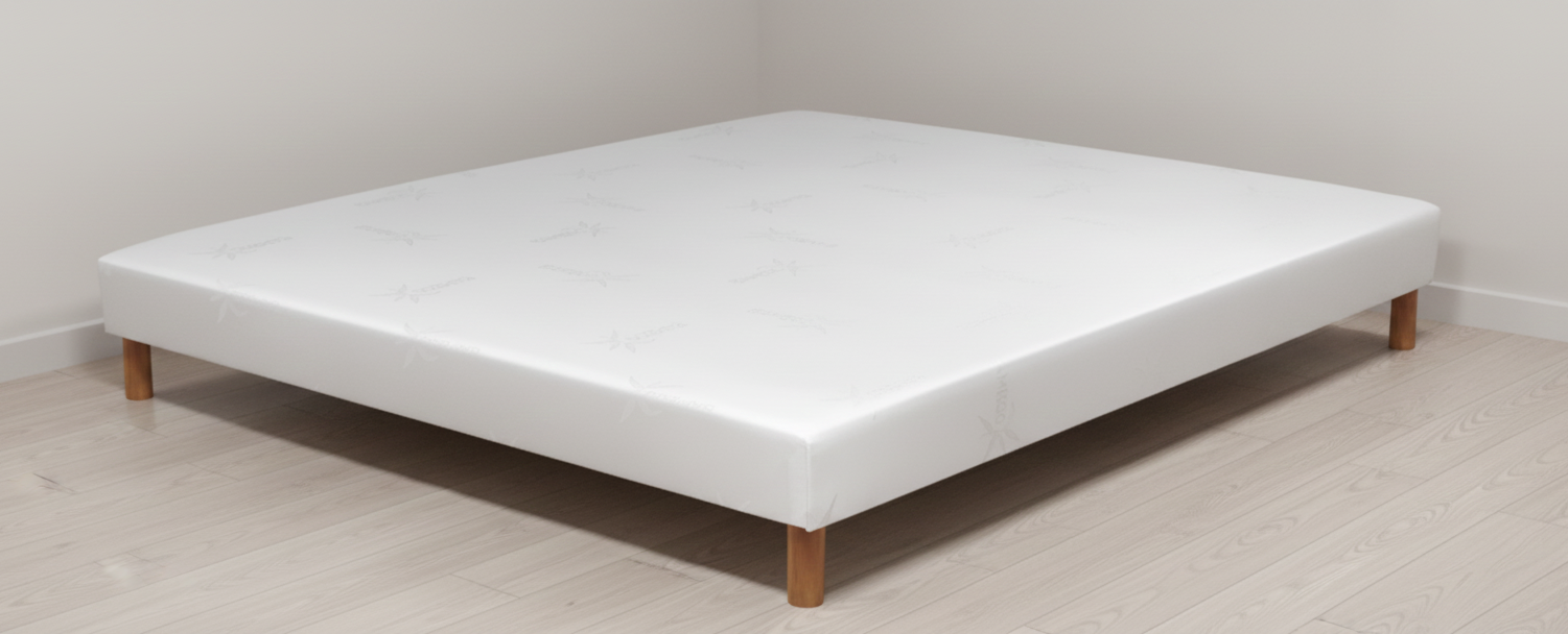 Sommier Ressorts biconiques & gaindage à la main 15cm 42 ressorts en acier galvanisé pour 140/190 Épaisseur possible jusqu'à 25cm 4 masses d'angle hêtre massif avec insert de 8mm (5 pour le 160/200) Caisse peuplier massif origine France Section de caisse 27mm / 130mmCoiffe tendue viscose de Bamboo Coutil Bamboo Norme 100 - Oeko-Tex Toile de fond anti-poussière - 100% PES Issu de forêts françaises Suspension ferme Compatible tout matelas Garantie 5 ans Fabrication Française