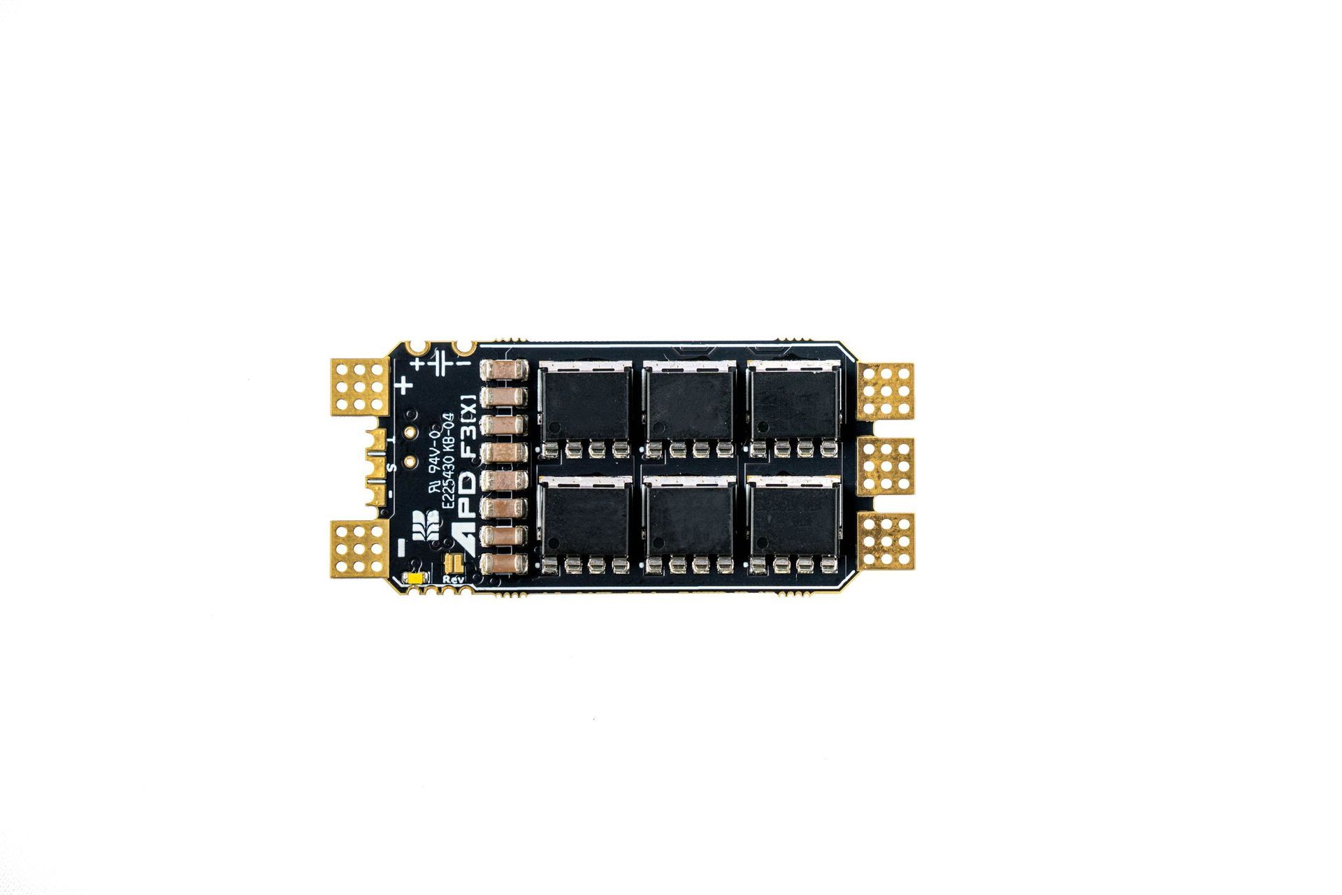 Eine schwarze elektronische Leiterplatte mit sechs quadratischen Mikrochips und vergoldeten Anschlussflächen an beiden Enden.