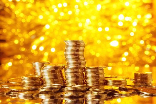 Goldmünzen als Illustration zu mehr über Gold kaufen Regensburg