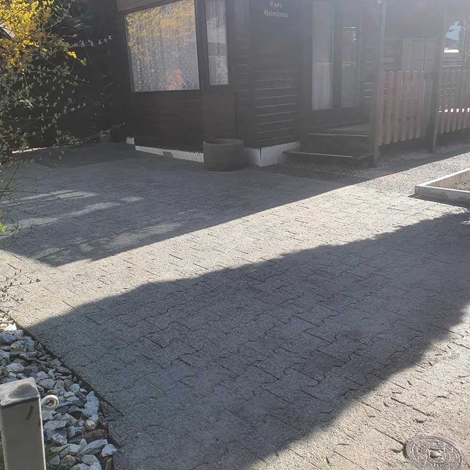 MC Construction Sàrl - Aménagement extérieur - terrassement - goudronnage - dallage - paysagisme