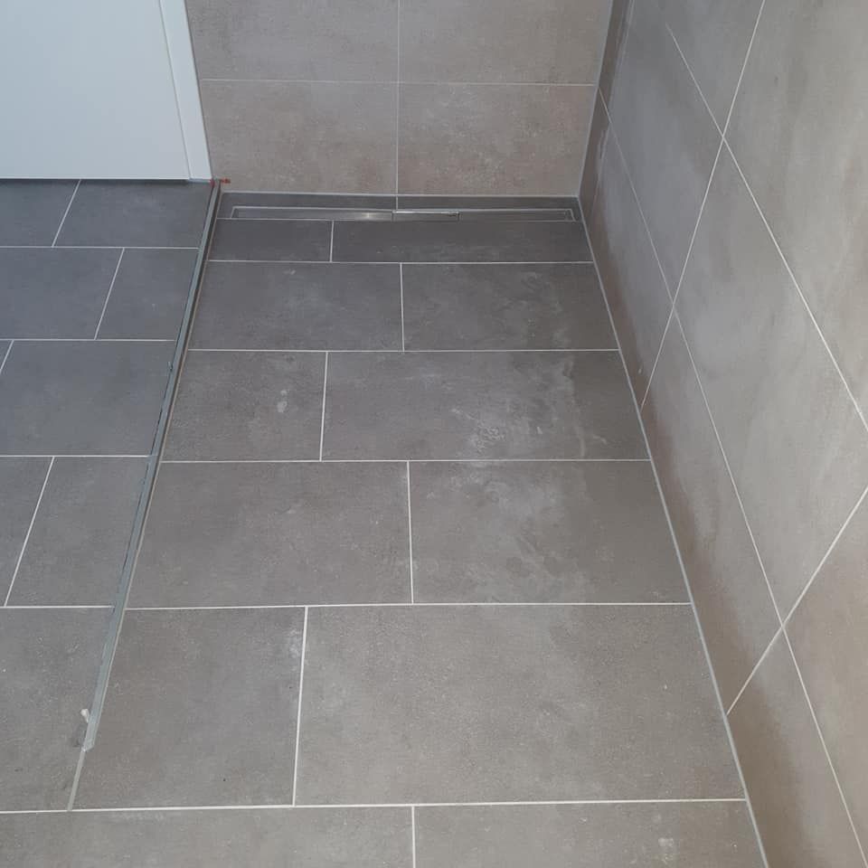 Logo MC Construction Sàrl - Calepinage - pose de carrelage - mosaïque- frises décoratives