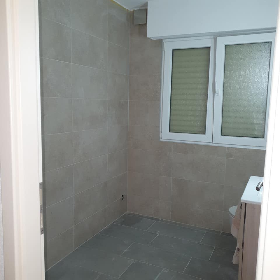 Logo MC Construction Sàrl - Calepinage - pose de carrelage - mosaïque- frises décoratives