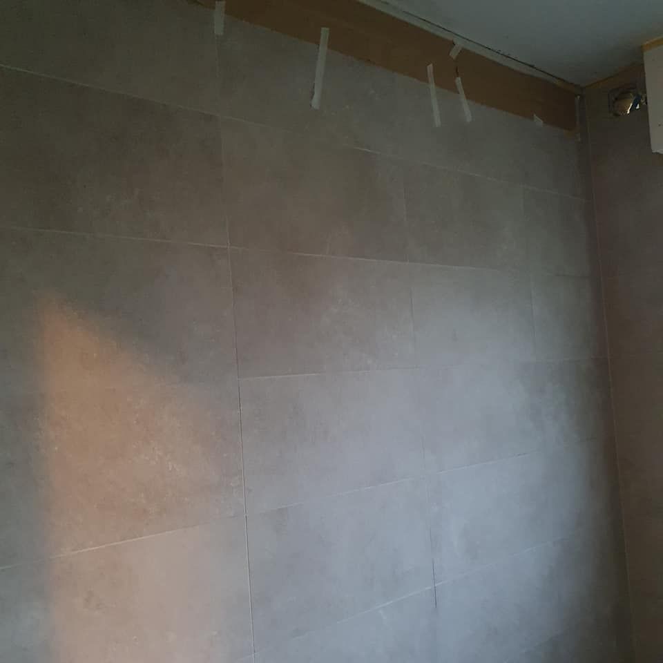 Logo MC Construction Sàrl - Calepinage - pose de carrelage - mosaïque- frises décoratives