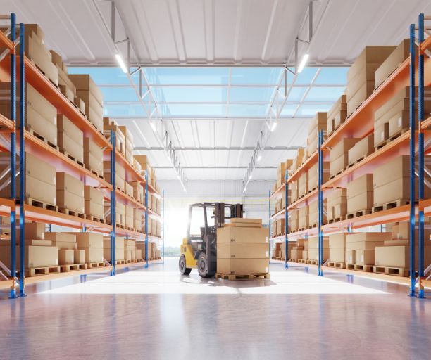 A forklift is moving a pallet of boxes in a warehouse.