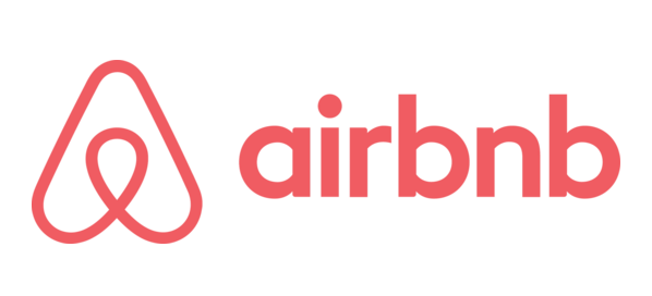 Airbnb logo in coral pink on a white background