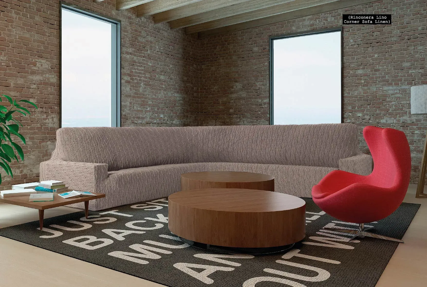 Una sala de estar con un sofá, una silla, una mesa de café y una alfombra.