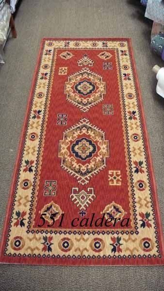 Una alfombra roja con la palabra caldera.