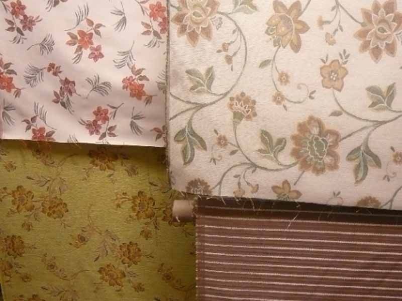 Un montón de diferentes tipos de telas con flores.