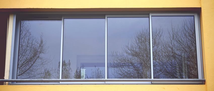 Baie coulissante 4 rails 4 vantaux aluminium olonne fermetures