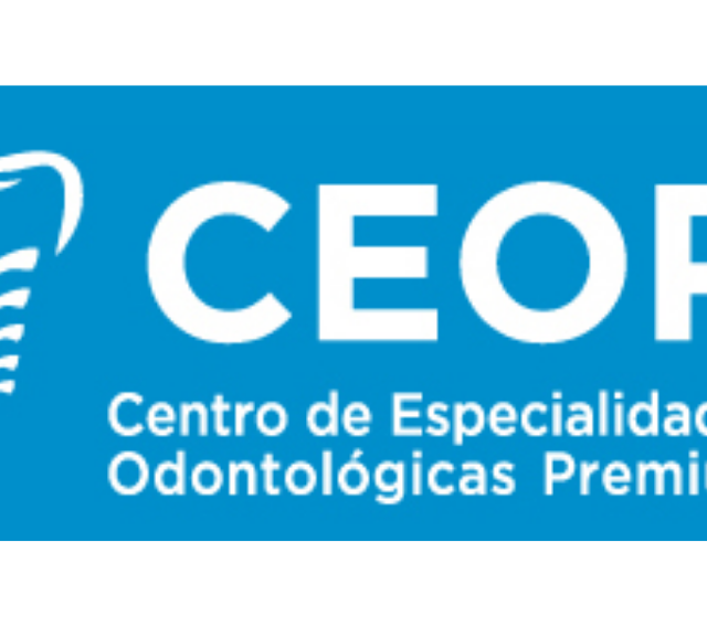 A blue sign that says centro de especialidad odontologicas premia