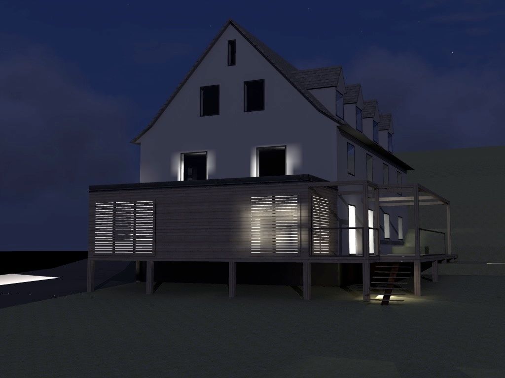 Photo d'une maison de nuit