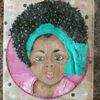 Un pastel con la foto de una niña.