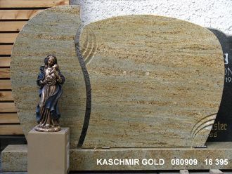 Grabstein aus Kaschmir Gold Granit mit geschwungener Form und einer Statue einer stehenden Madonna auf einem Sockel