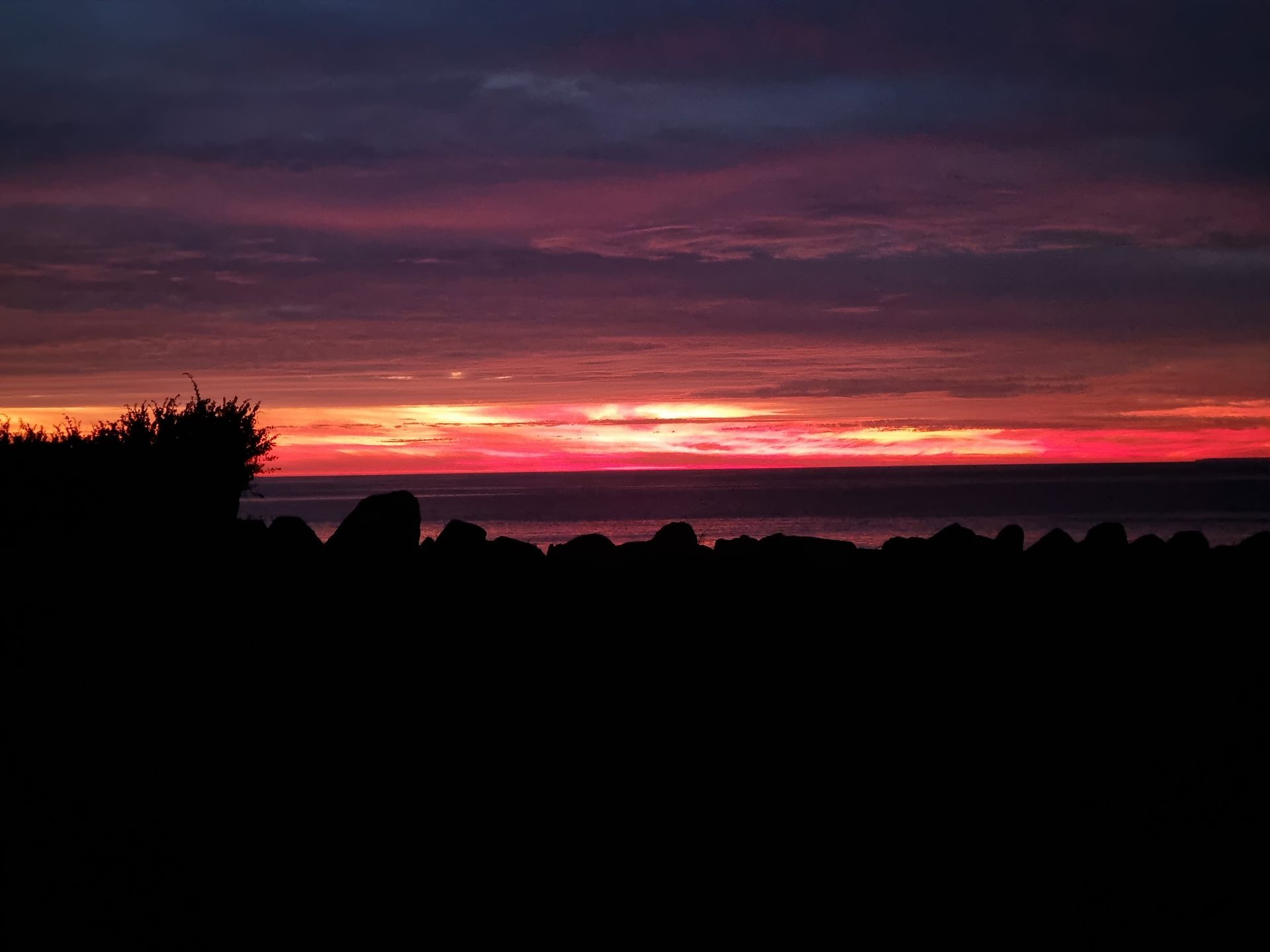 Sonnenuntergang über dem Meer - Blick von der Terrasse