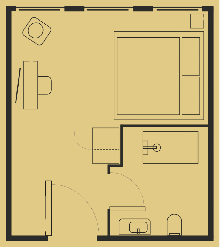 Floor plan of a studio apartment with a bathroom, kitchen, bed, desk, seating area, and windows. Black lines on a tan background.