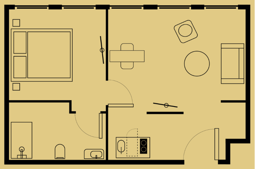 Floor plan of a small apartment with a bedroom, living space, and a bathroom with kitchen components.