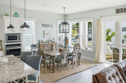 Driftwood Cottage dining area and kitchen in Navarre Beach