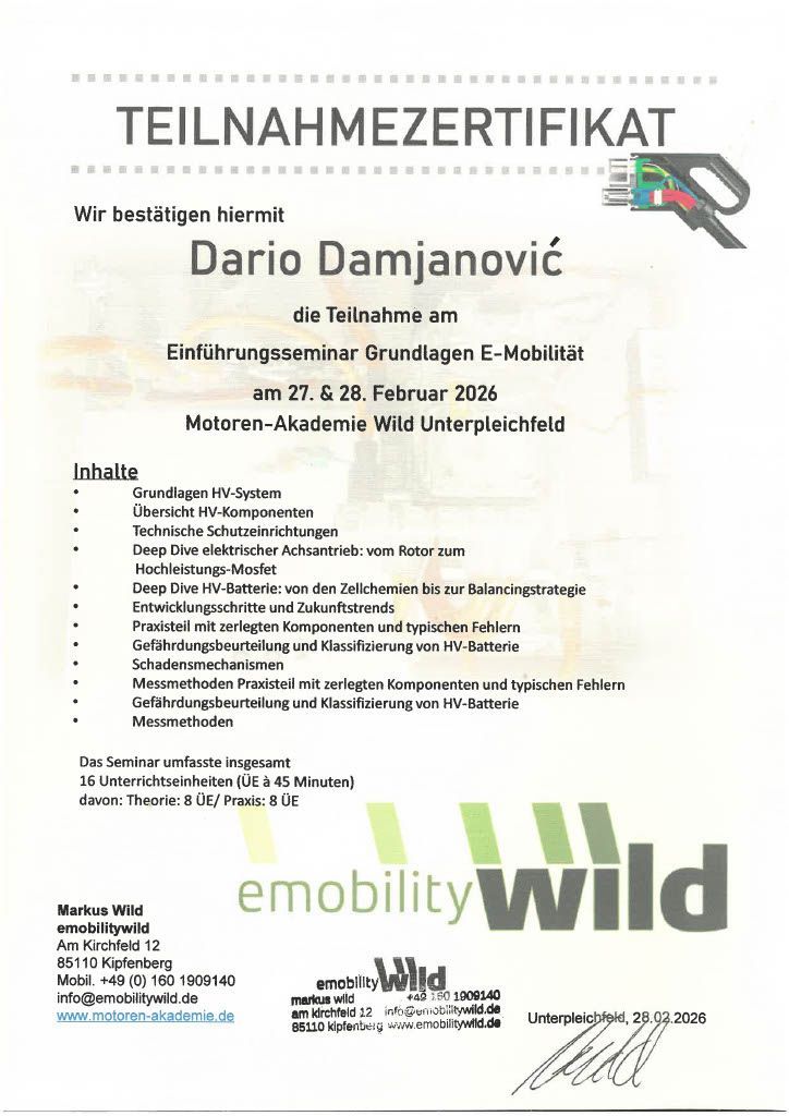 Ein Zertifikat mit der Aufschrift „Zertifikat“ ist von zwei Personen unterschrieben.