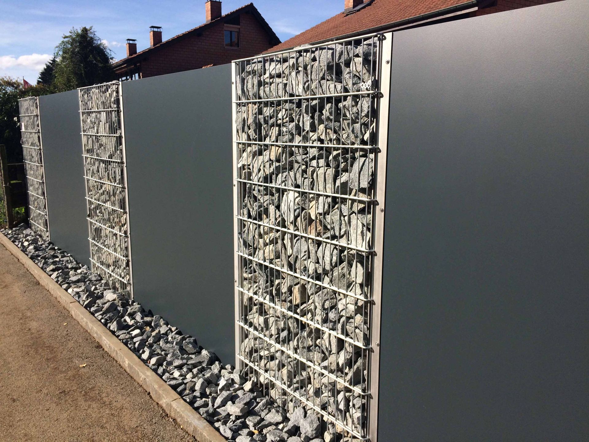 sichtschutz steinmauer - gebrüder meyer - zaunfabrik und schlosserei - münchenstein