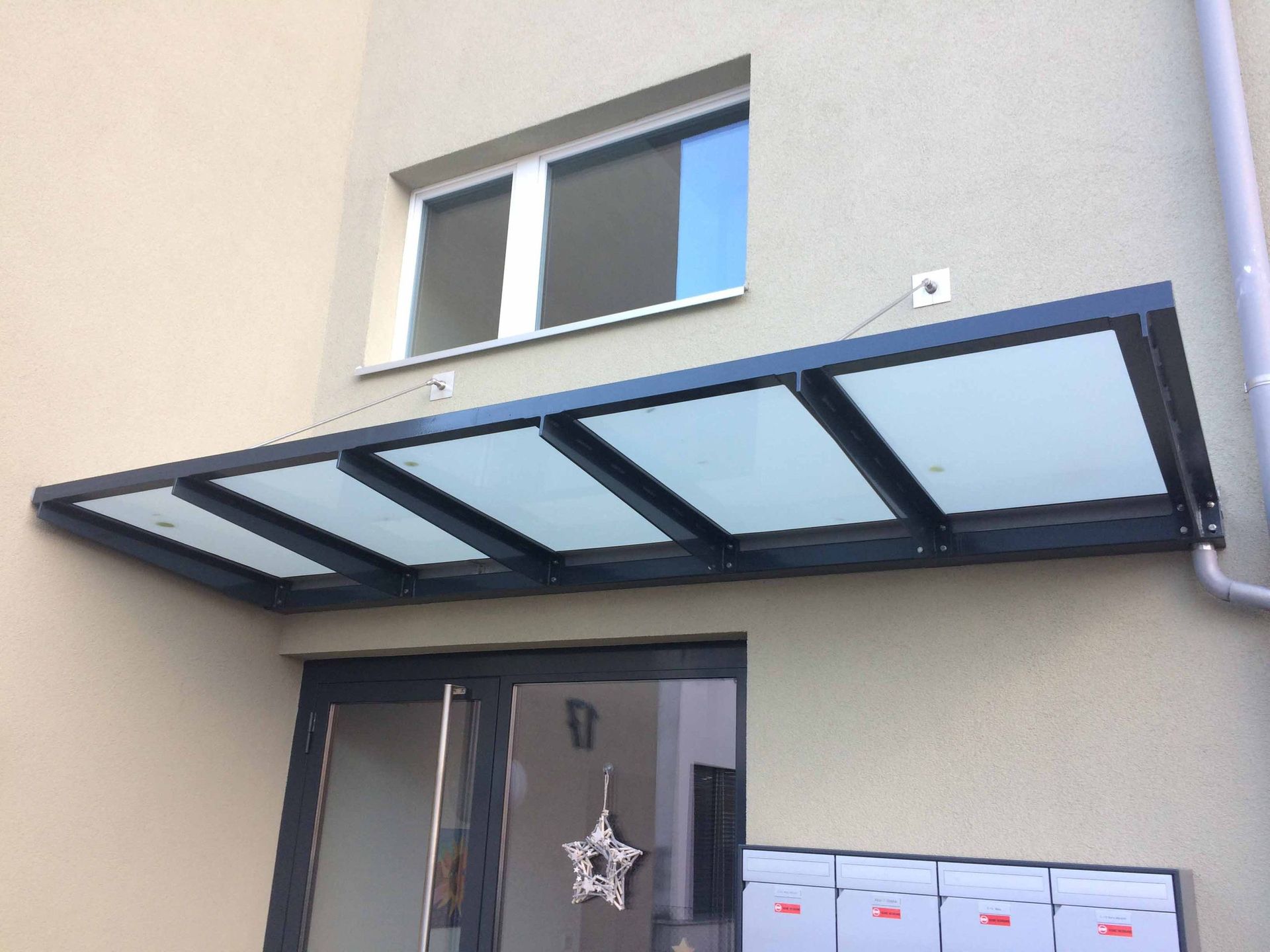 vordächer - gebrüder meyer - zaunfabrik und schlosserei - münchenstein