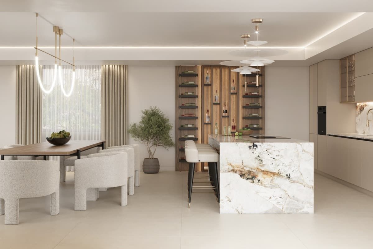 Una cocina y comedor con una gran isla en el medio de la habitación.