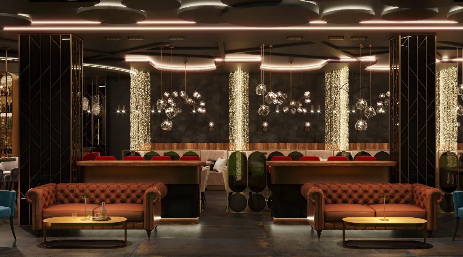 Una sala grande con muchos muebles y un bar.