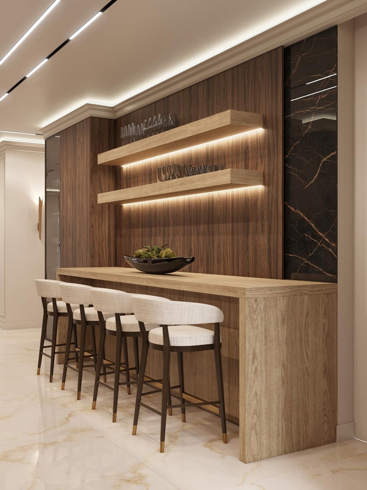 Una cocina con una larga mesa de madera y taburetes.