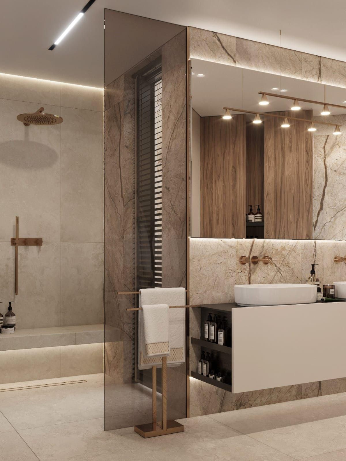 Un baño con lavabo, espejo y ducha.