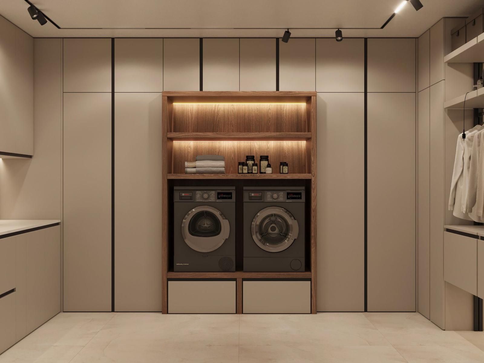 Un lavadero con lavadora y secadora.