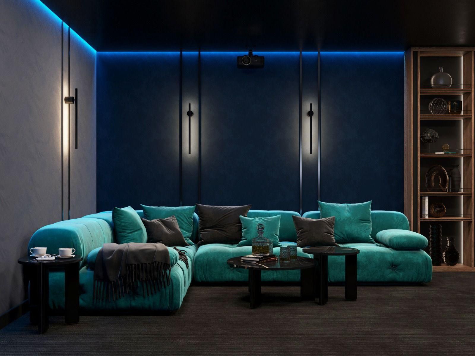 Una sala de estar con un sofá azul y una luz azul en el techo.