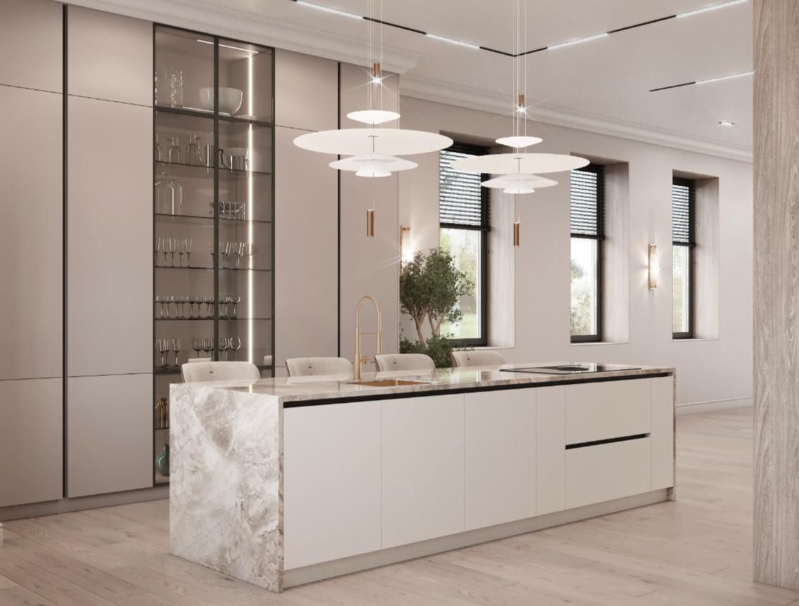 Hay una gran isla en el medio de la cocina.