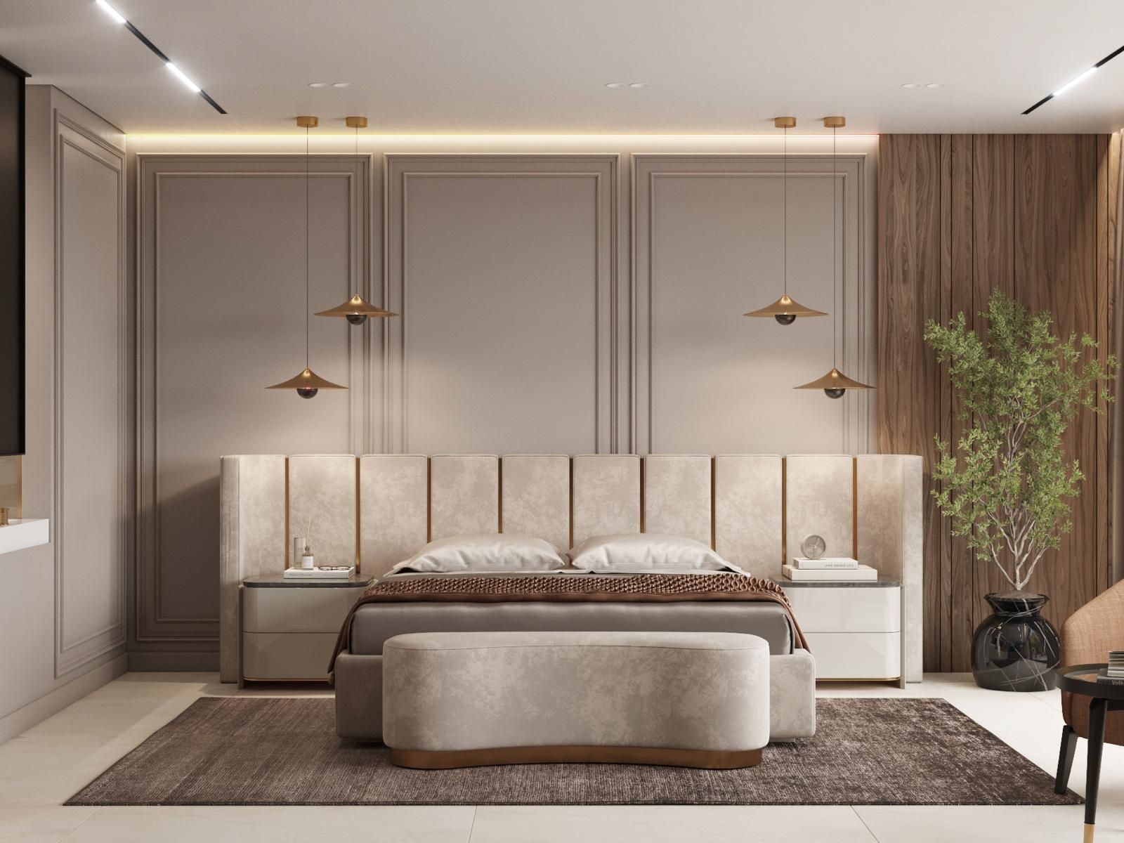 Un dormitorio con una cama grande, mesitas de noche, un banco y una alfombra.