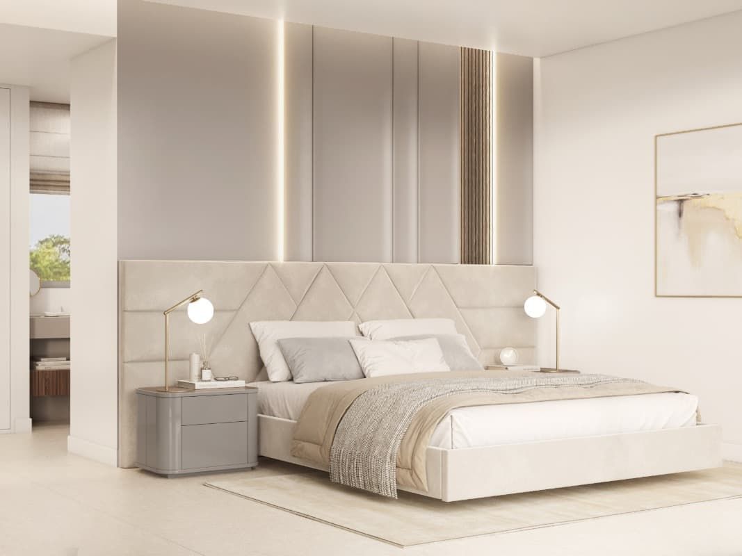 Un dormitorio con una cama grande y dos mesitas de noche.