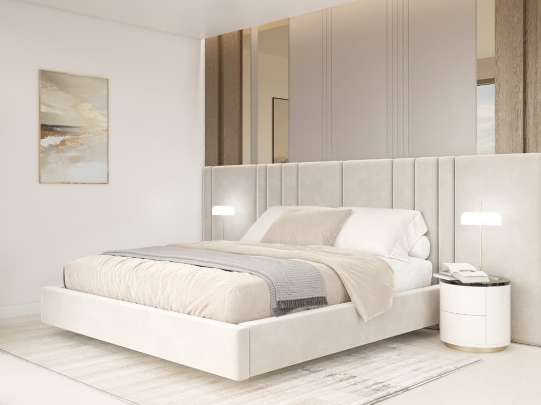 Un dormitorio con una cama, una mesita de noche y un cuadro en la pared.