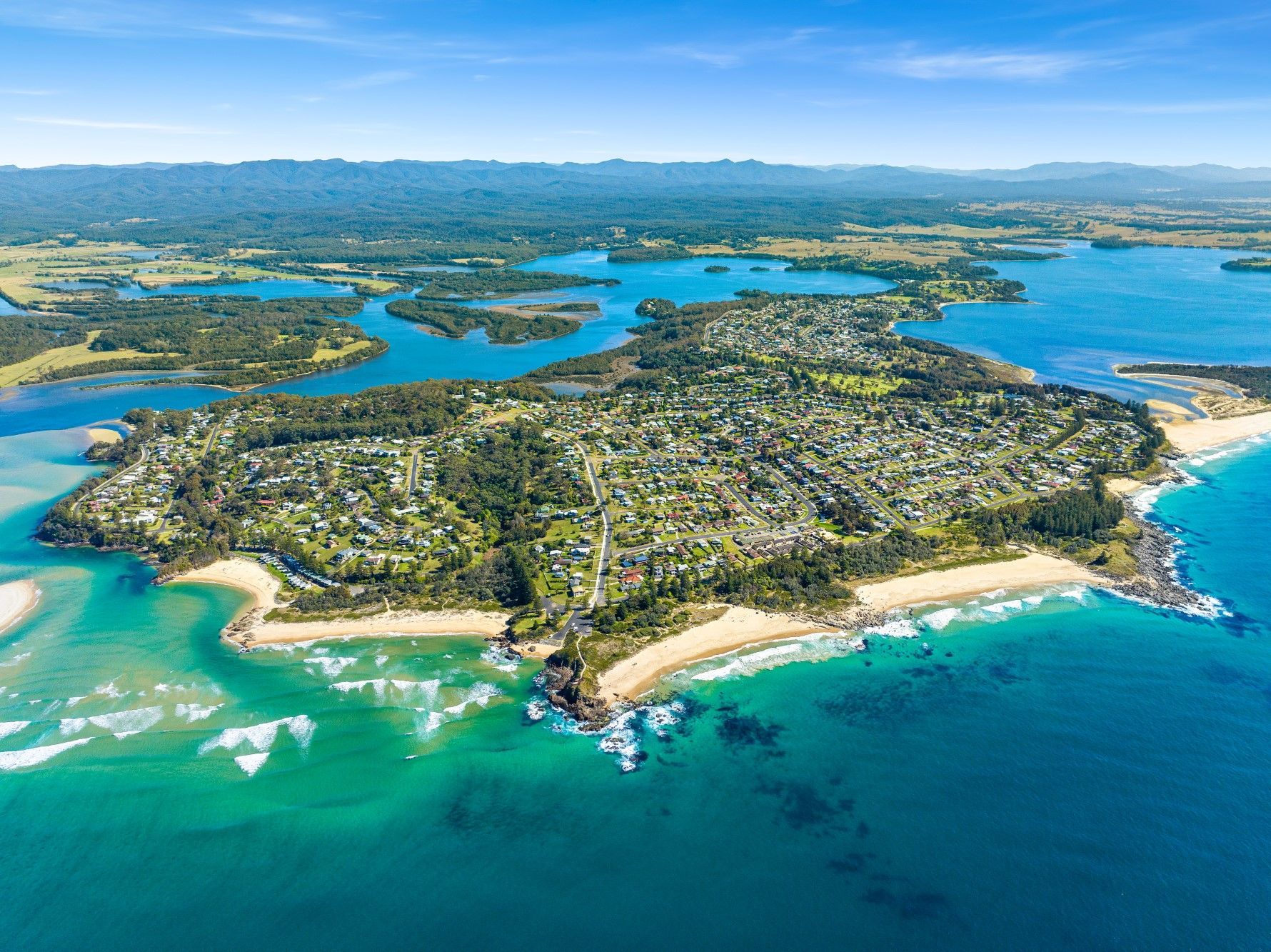 Aerial view across Tuross Head and its waterways