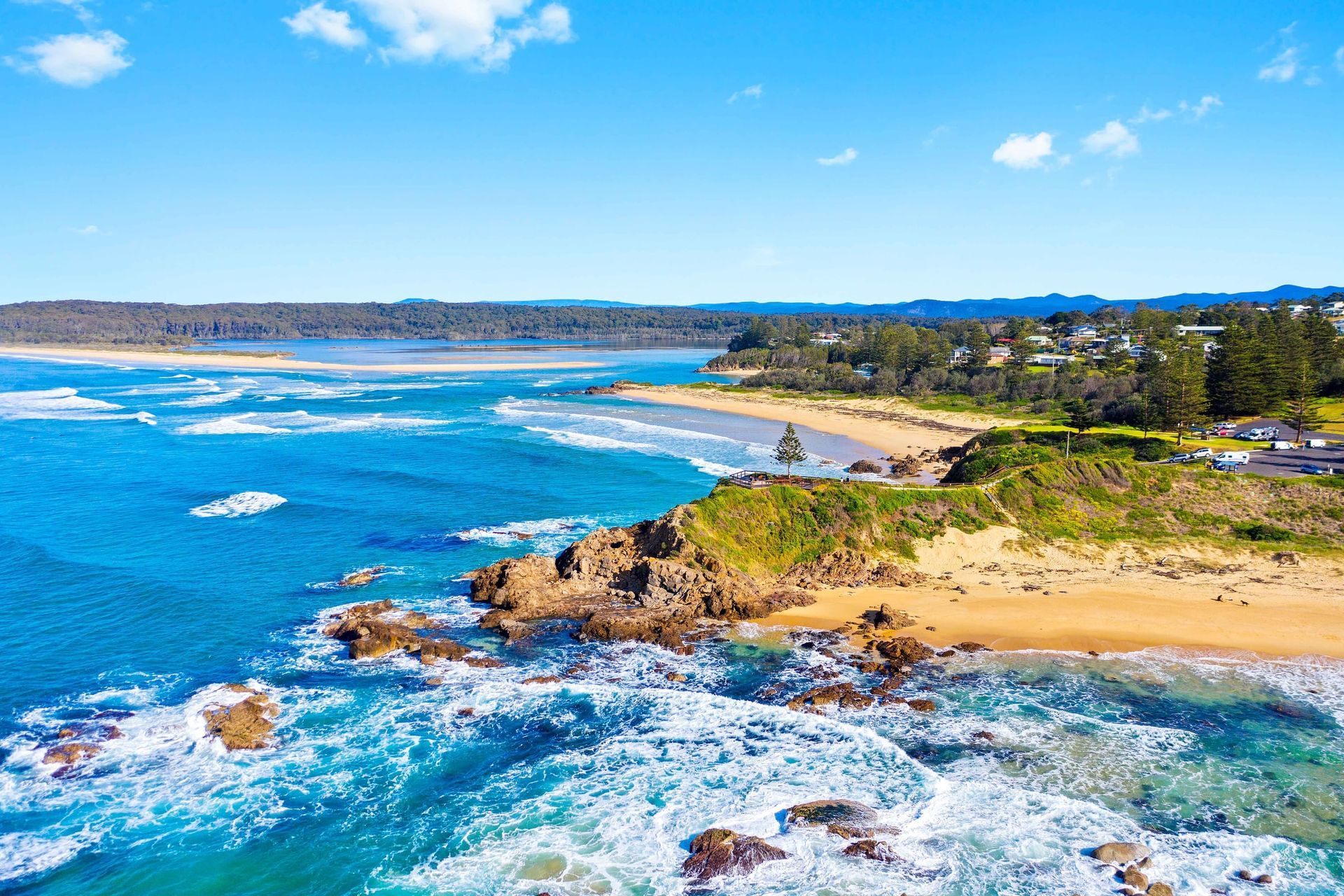 Aerial view of the Tuross Head coastline, beaches and lake entrance