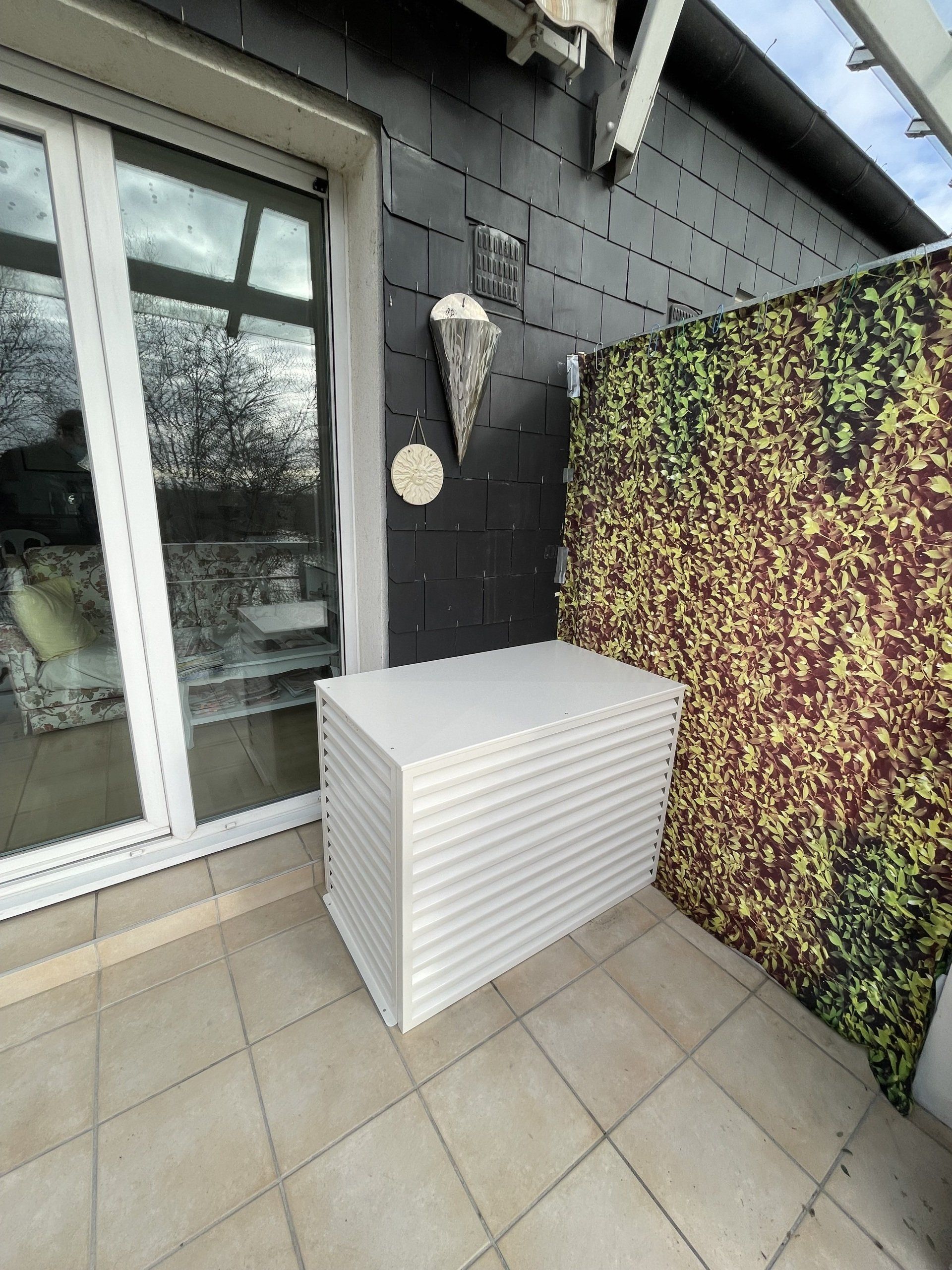 Pose d'un cache groupe extérieur